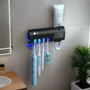 Wall mounted toothpaste dispenser toothbrush slots,