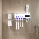 Wall mounted toothpaste dispenser toothbrush slots,